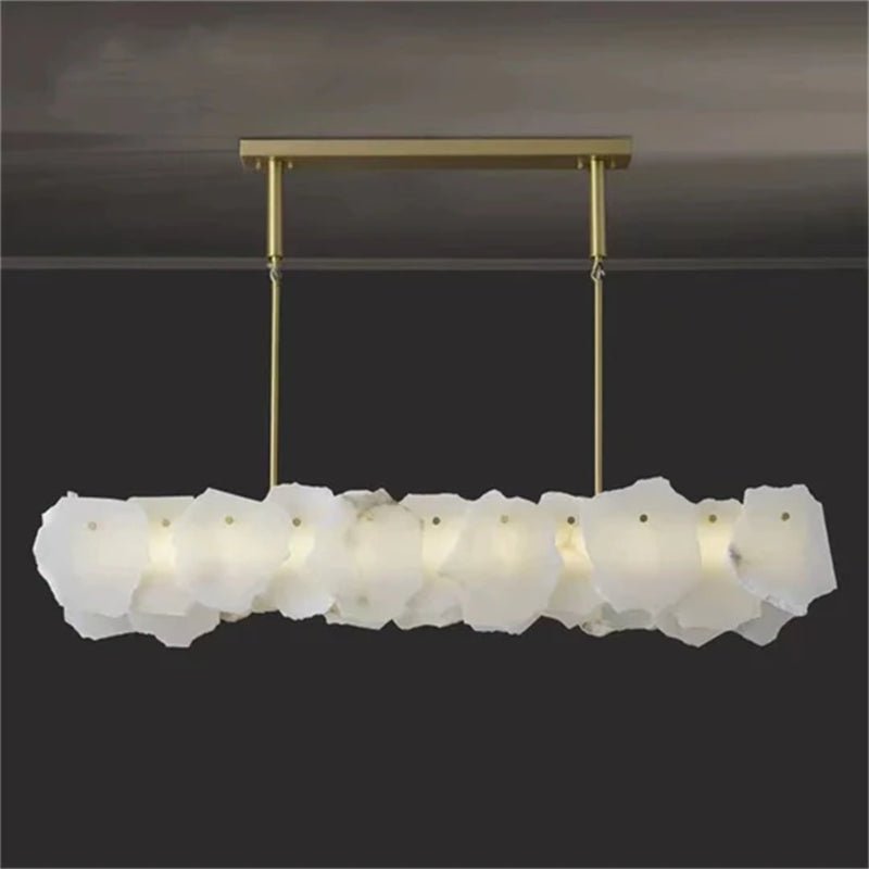 Carlos Alabaster Modern Snowflake Linear Chandelier Over Dining Table