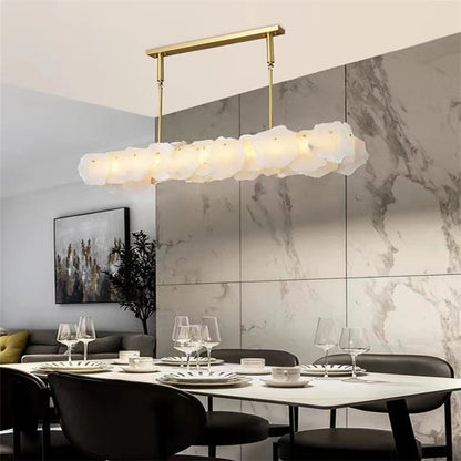Carlos Alabaster Modern Snowflake Linear Chandelier Over Dining Table